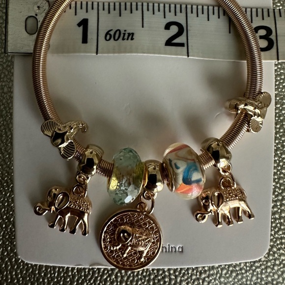 Elephant charm gold-tone bracelet - Picture 4 of 6